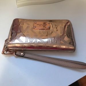 Michael Kors rose gold metallic wristlet